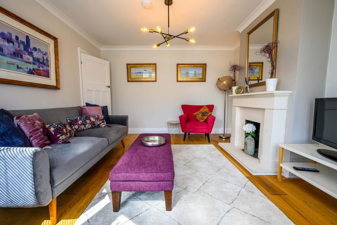 The living room is bright and airy
