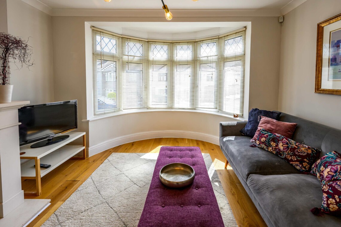 The living room is bright and airy