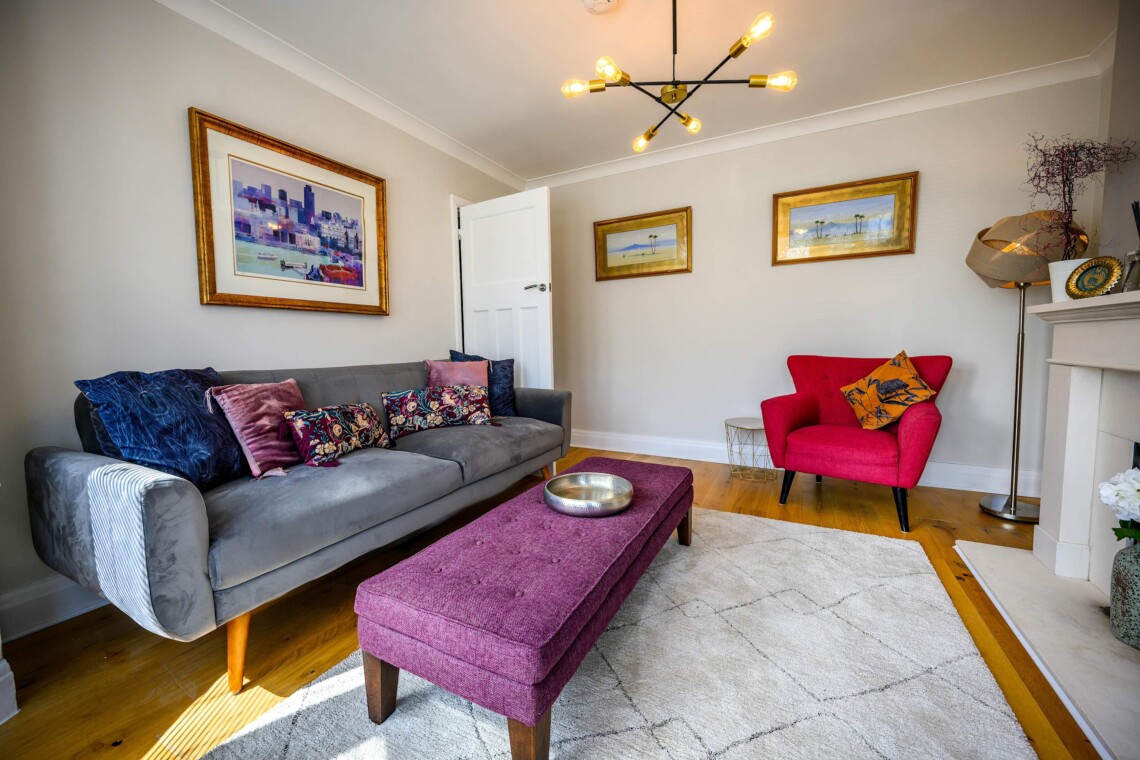 The living room is bright and airy