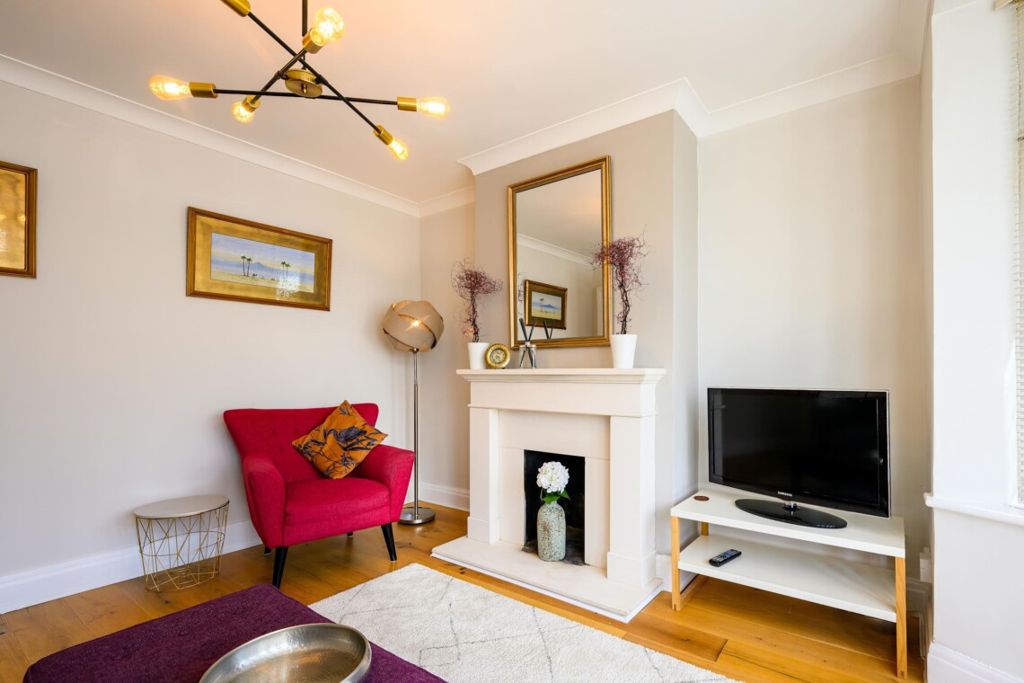 The living room is bright and airy