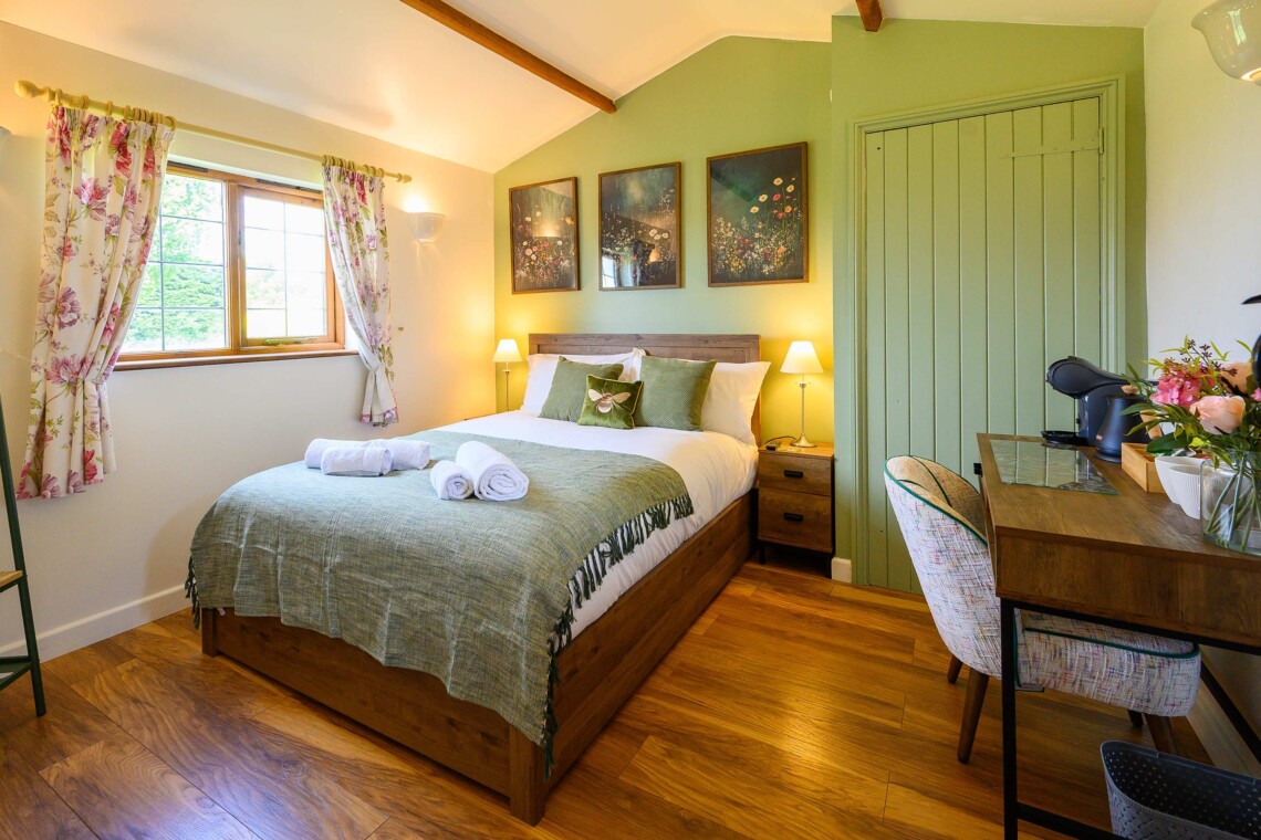 Rose bedroom with a double bed